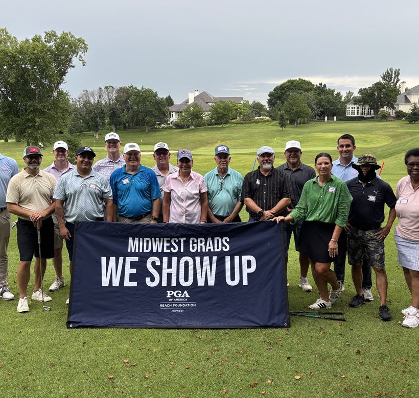 Midwest Grads celebration with We Show Up banner